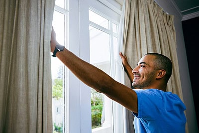 man waking up happy