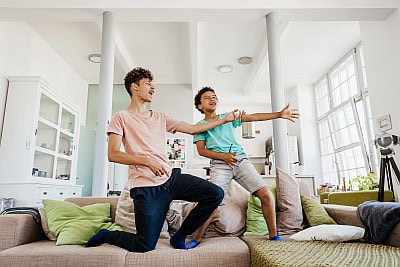 brothers playing inside