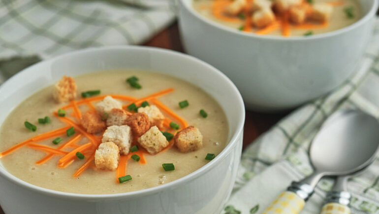 white bean soup with carrots on top